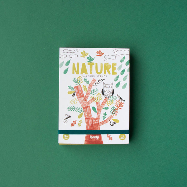 Pack of stamps with nature-themed design on a green background