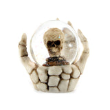 Puckator Skull Snow Globe in Skeleton Hand