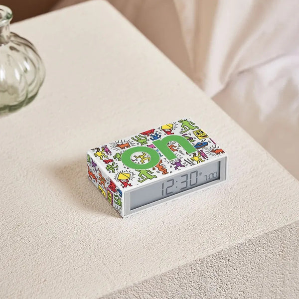 Lexon x Keith Haring Flip+ Reversible LCD Alarm Clock - Happy White