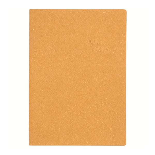Orange notebook with 'Our Story' embossed on it against a white background