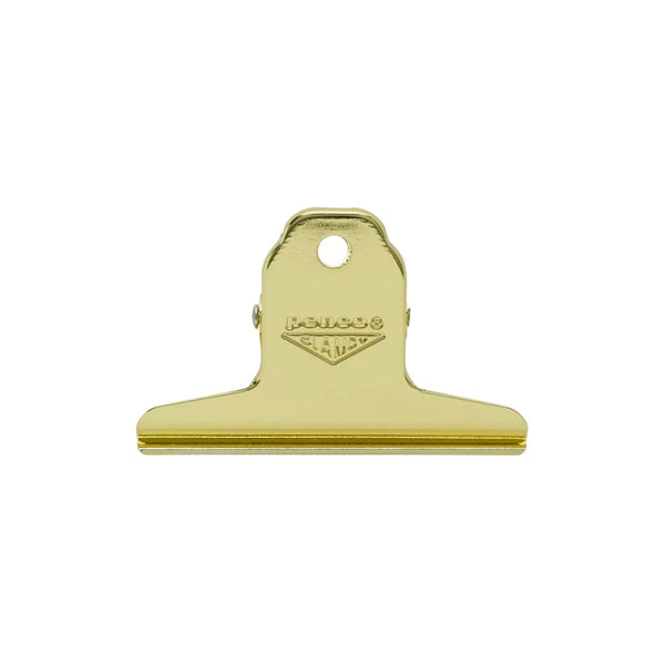 A gold-finished metal spring clip with a hanging loop and an embossed 'PENCO CLAMPY' logo, shown against a plain white background.