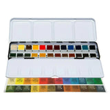 An open watercolor paint set in a white metal case, showing multiple color pans and a color chart strip below, photographed on a plain white background.